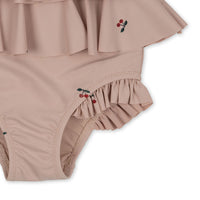 konges-sløjd-manuca-frill-swimsuit-cherry-blush-kong-s23ks4697-cb-12m