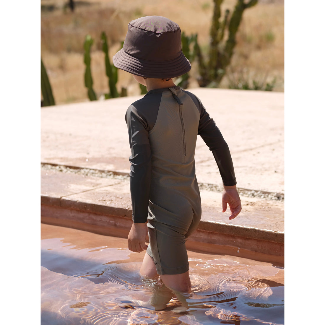 konges-slojd-aster-onesie-dino-overland-trek-kong-s23ks4617-ot-6m