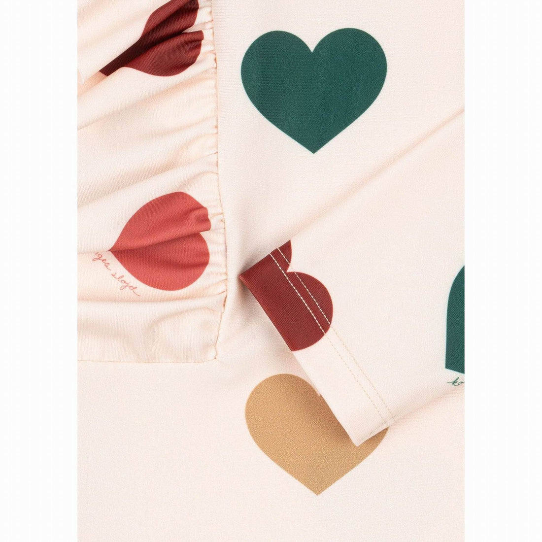 konges-slojd-manuca-swim-onesie-bon-coeur-color-clothing-wear-fashion-kong-s26ks105467-bcc-12m-04