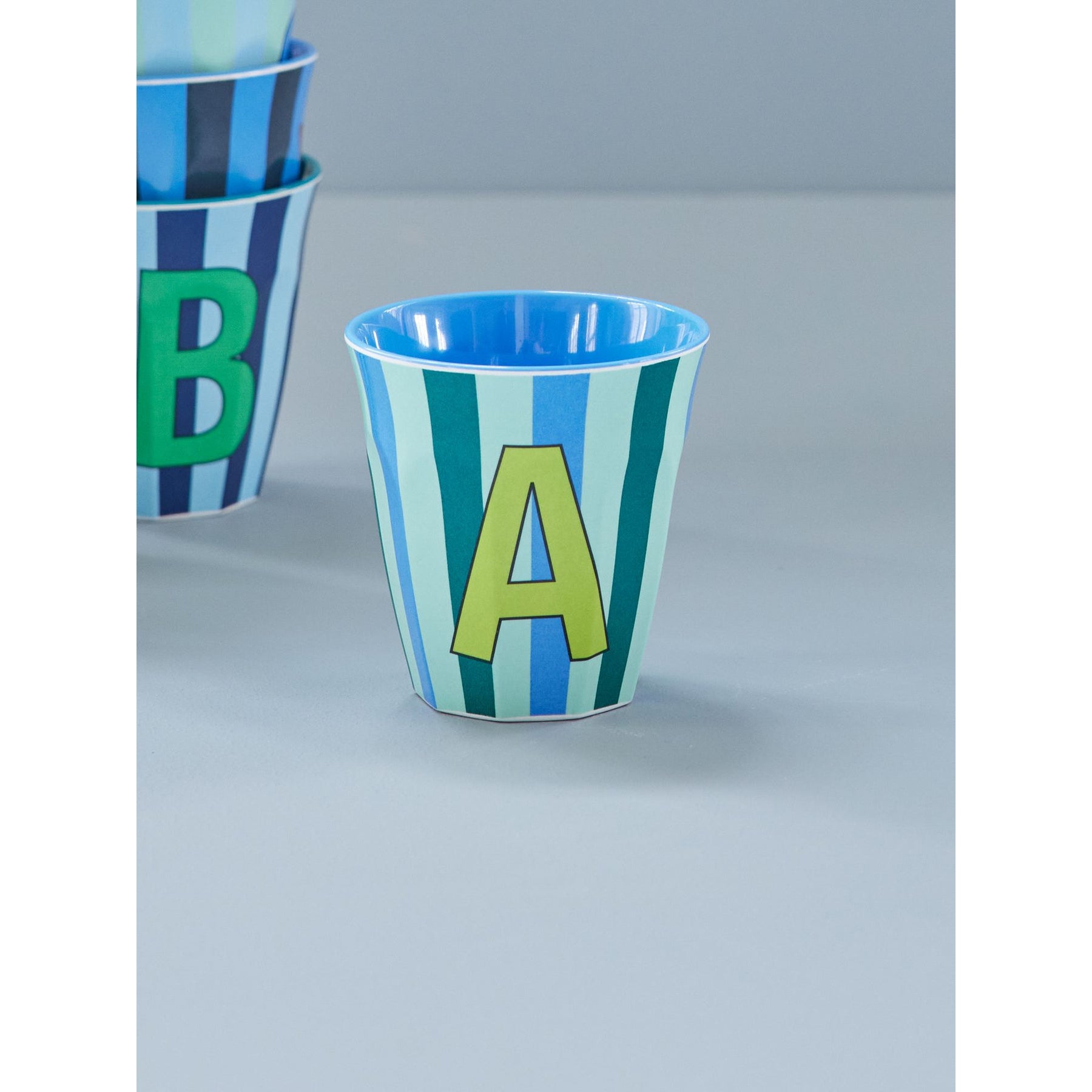 rice-dk-melamine-cup-with-the-letter-a-stripes-blueish-medium-250ml-rice-melcu-alpstrab