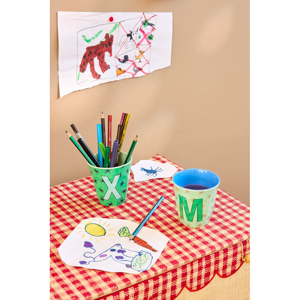 rice-dk-melamine-cup-with-the-letter-x-stars-medium-250-ml