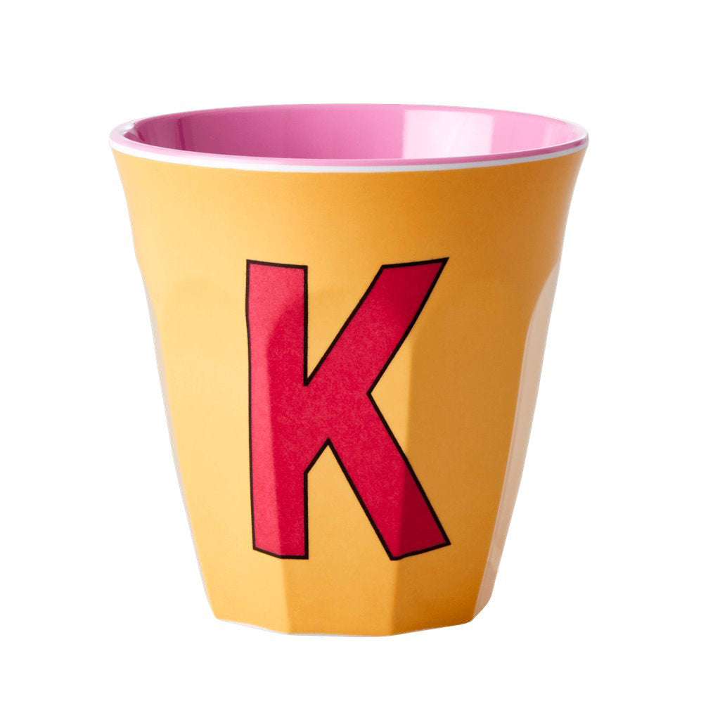 rice-dk-melamine-cup-with-the-letter-k-apricot-two-tone-medium-rice-melcu-alpki-01